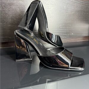 Black triangle heel sandals